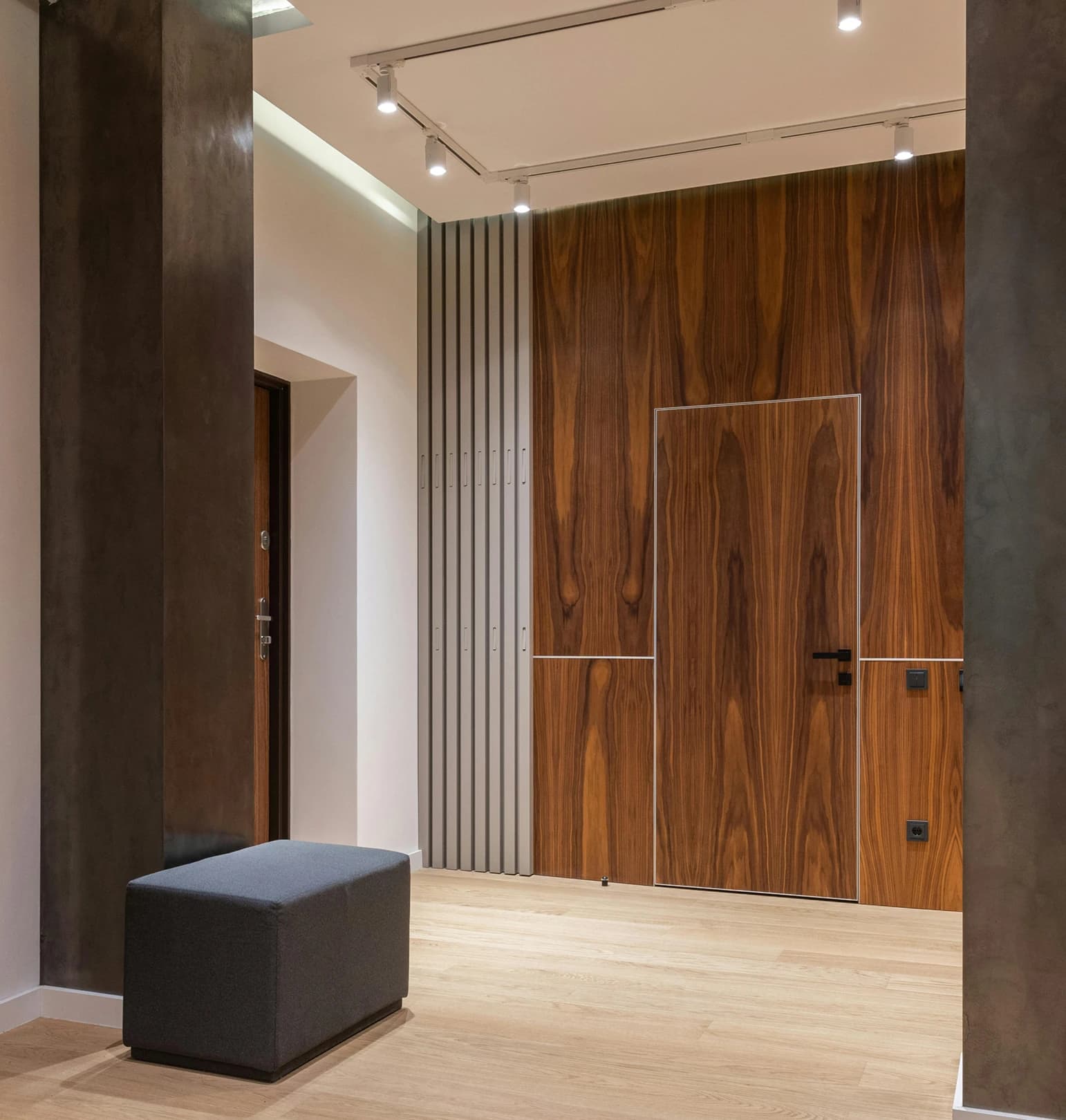 Modern interior design with wooden wall panels and minimalist furniture